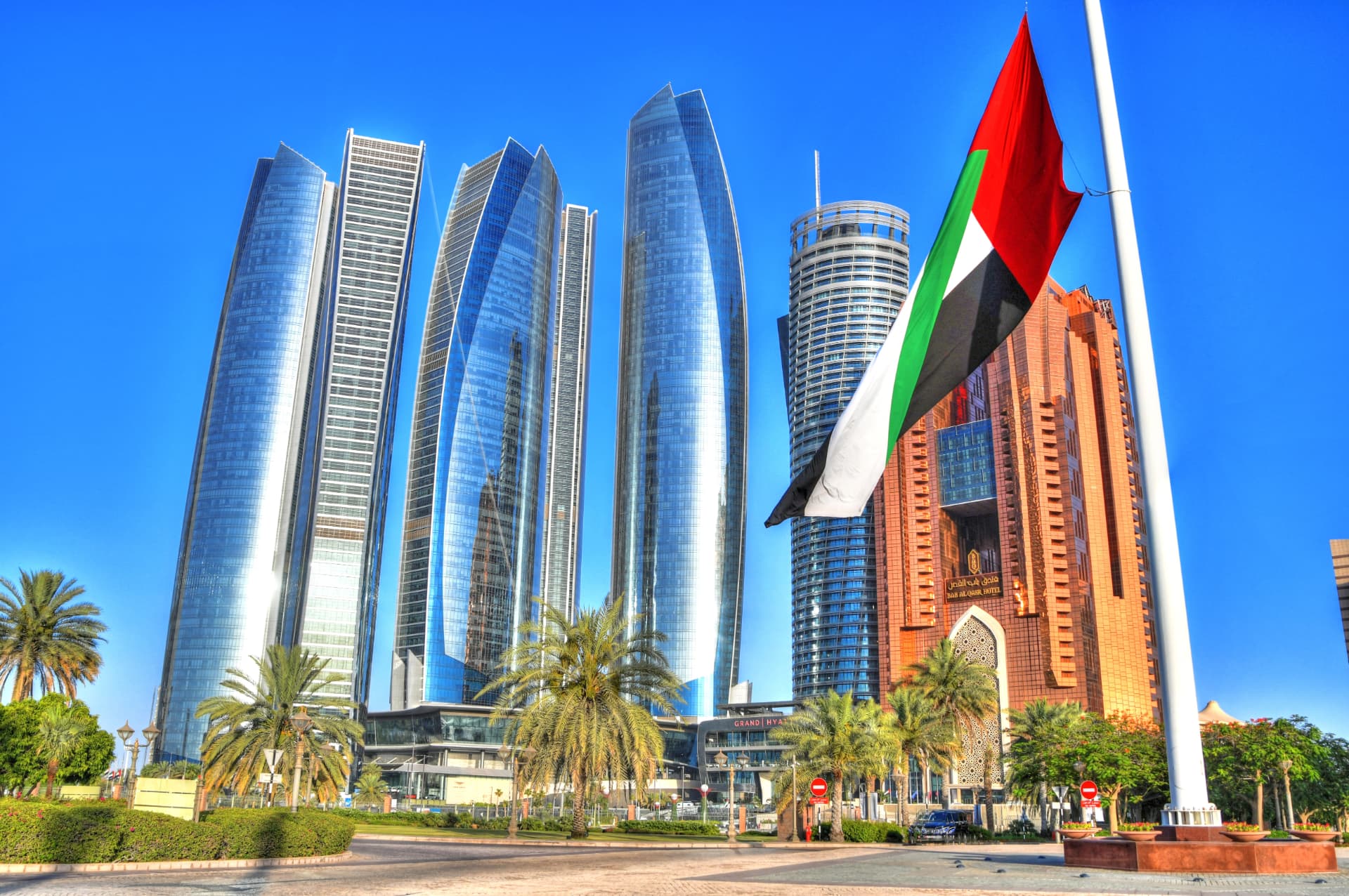 Abu Dhabi skyline with the UAE flag